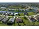 Scenic aerial view of a residential neighborhood nestled beside winding canals and waterways at 127 White Marsh Ln, Rotonda West, FL 33947