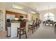 Spacious open kitchen with granite counters and stainless appliances at 127 White Marsh Ln, Rotonda West, FL 33947