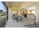 Screened lanai offers smooth indoor-outdoor transition and views to the home's interior layout at 127 White Marsh Ln, Rotonda West, FL 33947