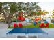 Community park featuring a ping pong table, colorful seating, food concessions and outdoor recreation at 13137 Oriago St, Venice, FL 34293