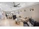 Spacious living room flows into the dining area, featuring neutral colors and great natural lighting at 13137 Oriago St, Venice, FL 34293