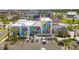 Modern retail space featuring colorful murals, ample parking, and a vibrant atmosphere at 13137 Oriago St, Venice, FL 34293