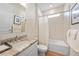 Clean bathroom features a single sink with stone countertops, a tub with shower, and neutral color palette at 1409 Remington Trace Dr, Port Charlotte, FL 33953