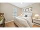 Comfortable bedroom with a full bed, complemented by bright natural light at 1409 Remington Trace Dr, Port Charlotte, FL 33953