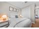 Cozy bedroom with ample natural light, closet, and a neutral color scheme, creating a calming and inviting space at 1409 Remington Trace Dr, Port Charlotte, FL 33953