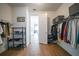 Large walk-in closet with custom shelving at 1409 Remington Trace Dr, Port Charlotte, FL 33953