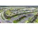 Community aerial view showcases manicured landscaping, amenities, and entrance to The Cove at 1409 Remington Trace Dr, Port Charlotte, FL 33953