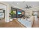Bright and spacious living room featuring recessed lighting, modern decor, and a cozy fireplace at 1409 Remington Trace Dr, Port Charlotte, FL 33953