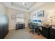 Bright home office featuring a large window, comfortable seating, and stylish decor at 1409 Remington Trace Dr, Port Charlotte, FL 33953
