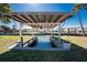 A covered boat lift on the canal adds value and convenience to the waterfront property at 1456 Deer Creek Dr, Englewood, FL 34223