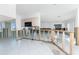 Spacious kitchen ready to be updated, featuring white tile floors and an open layout at 1456 Deer Creek Dr, Englewood, FL 34223