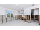 View of future living room with large window and storage space ready for remodel at 1456 Deer Creek Dr, Englewood, FL 34223
