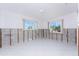 Large living room with view to outdoors ready for new drywall and renovations at 1456 Deer Creek Dr, Englewood, FL 34223