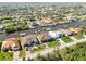 Wide angle shot of a waterfront neighborhood featuring many houses and water canals at 15578 Seafoam Cir, Port Charlotte, FL 33981