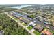 A panoramic view of a waterfront neighborhood with canals, houses and lots of greenery at 15578 Seafoam Cir, Port Charlotte, FL 33981