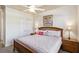 Bright bedroom features a double closet and neutral decor, with carpeted flooring at 15578 Seafoam Cir, Port Charlotte, FL 33981