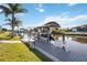 Scenic view of a private boat dock on the canal, perfect for boating enthusiasts and waterfront living at 15578 Seafoam Cir, Port Charlotte, FL 33981