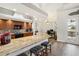 Kitchen featuring a center island with bar seating and granite countertops at 15578 Seafoam Cir, Port Charlotte, FL 33981