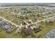 Aerial view of a residential neighborhood showcasing single-Gathering homes with varying architectural styles and landscaping at 16137 Alcira Cir, Punta Gorda, FL 33955