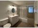 Bathroom featuring vanity with sink and shower-tub combo at 192 Garden Nw Ave, Port Charlotte, FL 33952