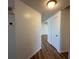 Hallway featuring modern flooring and white paint at 192 Garden Nw Ave, Port Charlotte, FL 33952