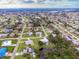 Aerial view of home in community, highlighting the surrounding neighborhood, trees, and waterways at 2545 Geneva Rd, Venice, FL 34293