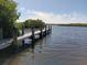 Scenic dock and waterway offering access to the river, and nearby mangroves at 2545 Geneva Rd, Venice, FL 34293