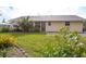 Charming home with lush front yard landscaping and a welcoming entrance at 2545 Geneva Rd, Venice, FL 34293