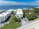 Beautiful aerial shot of La Capilla Condominiums with lush landscaping near the beach at 2820 N Beach Rd # 101, Englewood, FL 34223