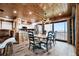Charming dining area with modern furnishings and coastal accents, perfect for enjoying meals with a scenic ocean view at 2820 N Beach Rd # 101, Englewood, FL 34223