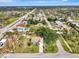 High aerial view showcasing the neighborhood, nearby amenities, and the home's location at 35 Michigan Ave, Englewood, FL 34223