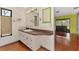 The bathroom has a vanity and is connected to the main living area at 35 Michigan Ave, Englewood, FL 34223