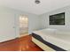 Bedroom with access to bathroom and a bed at 35 Michigan Ave, Englewood, FL 34223