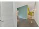 Hallway view, including doors to bedrooms and view through the house at 35 Michigan Ave, Englewood, FL 34223