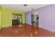 Bright living room with shiny floors and a view of the patio at 35 Michigan Ave, Englewood, FL 34223