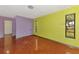 Living room with retro color scheme and ample space at 35 Michigan Ave, Englewood, FL 34223