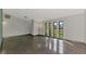 This open living space boasts ample natural light with plenty of room for furniture at 35 Michigan Ave, Englewood, FL 34223