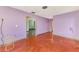 An open living room with polished floors offers flexible design options at 35 Michigan Ave, Englewood, FL 34223