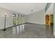 Bright living room boasts large windows and an open floor plan at 35 Michigan Ave, Englewood, FL 34223