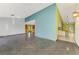 Open floor plan with view of the kitchen and colorful decor in this home at 35 Michigan Ave, Englewood, FL 34223