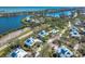 Aerial view of the property with the home highlighted, showcasing its location near the water at 36 Seawatch Dr, Boca Grande, FL 33921