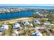 Aerial view of the property with the home highlighted, showcasing its location near the water at 36 Seawatch Dr, Boca Grande, FL 33921