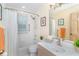 Bright bathroom with a bathtub and shower, a toilet, and a sink vanity at 36 Seawatch Dr, Boca Grande, FL 33921