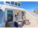 Exterior view of deck, lounge chairs, and access to bedroom at 36 Seawatch Dr, Boca Grande, FL 33921