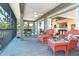 Relaxing screened porch with comfortable seating and views of the surrounding nature at 36 Seawatch Dr, Boca Grande, FL 33921
