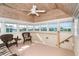 Bright sunroom with multiple windows showing water views at 36 Seawatch Dr, Boca Grande, FL 33921