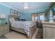 Cozy main bedroom with a waterfront view and light-colored furniture at 5041 N Beach Rd # 3A And 3B, Englewood, FL 34223