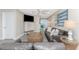 Inviting living room with a view of the water, comfortable seating, and stylish decor at 5041 N Beach Rd # 3A And 3B, Englewood, FL 34223