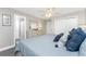 Bright bedroom features a comfortable bed, soft lighting, and an en-suite bathroom at 5041 N Beach Rd # 3A And 3B, Englewood, FL 34223