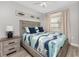 Serene bedroom with a full bed, ocean-themed decor, and a tranquil ambiance at 5041 N Beach Rd # 4A And 4B, Englewood, FL 34223